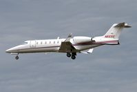 N66SG @ EGNT - Learjet 45 on finals to 25 at Newcastle Airport, September 2008. - by Malcolm Clarke