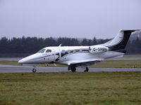 G-SRBN @ EGPH - Flairjet EMB-500 Taxiing to runway 06 - by Mike stanners