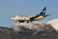 C-GPWS @ CYXY - Arriving at Whitehorse at 20:55, on WestJet's first-ever YVR-YXY sched flight. - by Murray Lundberg