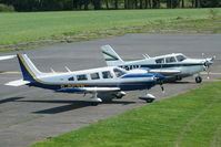 G-BEZP @ EGBM - parked alongside G-TALF, Tatenhill Aviation's PA-24 - by Chris Hall