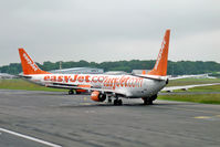 G-EZJR @ EGNT - Boeing 737-73V, Newcastle Airport, June 2009. - by Malcolm Clarke