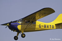 G-BXTO @ EGHR - Over the threshold for runway 32 - by John Richardson