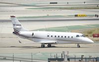 N748QS @ KLAX - Taxiing to parking at LAX - by Todd Royer