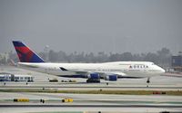 N664US @ KLAX - Taxiing to gate at LAX - by Todd Royer