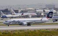 N517AS @ KLAX - Taxiing to gate at LAX - by Todd Royer