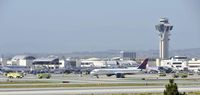 N650DL @ KLAX - Surrounded by fire equipment after an emergency landing - by Todd Royer
