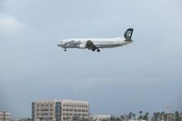 N771AS @ ONT - Passing the outer fence for 26R - by Helicopterfriend