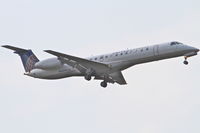 N16961 @ KORD - ExpressJet/United Express, Embraer EMB-145LR, ASQ5844 arriving from KDSM, RWY 10 approach KORD. - by Mark Kalfas