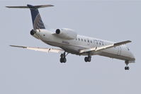 N16961 @ KORD - ExpressJet/United Express, Embraer EMB-145LR, ASQ5844 arriving from KDSM, RWY 10 approach KORD. - by Mark Kalfas