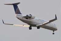 N920SW @ KORD - SkyWest/United Express Bombardier CL-600-2B19, SKW5378 arriving from Dane Co Rgnl /KMSN, RWY 10 approach KORD. - by Mark Kalfas