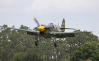 N923 @ FA08 - Kermit Weeks is landing his P-40 - by olivier Cortot