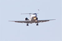 N13992 @ KORD - ExpressJet Airlines/United Express Embraer ERJ-145LR, ASQ5901 arriving from Rapid City Regional /KRAP,dodging birds on final for RWY 14R KORD. - by Mark Kalfas