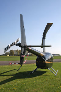 G-MAXZ @ EGBR - Robinson R44 Raven, Breighton Airfield, April 2011. - by Malcolm Clarke