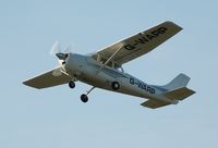 G-WARP @ EGFH - Cessna Skylane departing Runway 22. - by Roger Winser