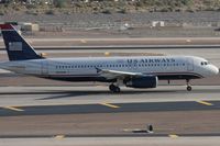 N669AW @ PHX - Taken at Phoenix Sky Harbor Airport, in March 2011 whilst on an Aeroprint Aviation tour - by Steve Staunton