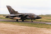ZA461 @ EGQS - Tornado GR.1, callsign Jackal 4, of 617 Squadron taxying to Runway 05 at RAF Lossiemouth in April 1996. - by Peter Nicholson