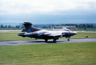 XV864 @ EGQS - Buccaneer S.2B of 12 Squadron taxying to Runway 05 at RAF Lossiemouth in May 1990. - by Peter Nicholson