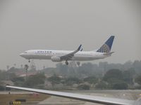 N73299 @ LAX - Landing on 24R during an overcast day - by Helicopterfriend