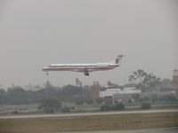 N807AE @ LAX - Landing on 24R during an overcast day - by Helicopterfriend
