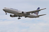 N663UA @ KORD - United Airlines Boeing 767-322, UAL959 arriving from EGGL/LHR, RWY 28 approach KORD. - by Mark Kalfas