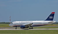 N704US @ CLT - A US Airways Airbus A319-112 taxiing after landing at CLT - by mcmtanyel