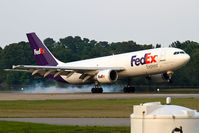 N667FE @ ORF - FedEx N667FE (FLT FDX399) from McGhee Tyson Knoxville Int'l (KTYS) landing RWY 23. - by Dean Heald