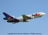 N377FE @ KPHL - FedEX 445 Heavy climbing out from 9R at PHL. - by Thomas P. McManus