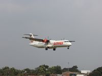 PK-WFG @ WICC - 72-500 Landing at runway 29 BDO - by Chandra Dwi Putra