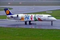 D-ACJH @ EDDL - Canadair CRJ-100LR [7499] (Lufthansa Regional)  Dusseldorf~D 26/05/2006. Taxiing in the rain for departure. - by Ray Barber
