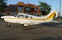 N229DM @ KAXN - Piper PA-28-181 Cherokee at the fuel pump. - by Kreg Anderson