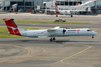 VH-QOE @ YSSY - At Sydney - by Micha Lueck