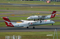 VH-QOX @ YSSY - With TQY in the background - by Micha Lueck