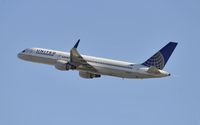 N549UA @ KLAX - Departing LAX on 25R - by Todd Royer