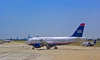 N741UW @ CLT - Taxiing at CLT - by Murat Tanyel