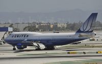 N118UA @ KLAX - Taxing to gate after arriving on 25L at LAX - by Todd Royer