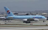HL7614 @ KLAX - Taxiing to gate after arriving at LAX on 25L - by Todd Royer