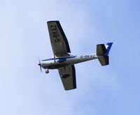 G-BKAZ - Flew over my house..captured with 300mm telephoto lens - by Gary Hudson