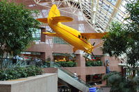 C-FMAM - Hangsfrom the ceiling of the Suncor Energy Centre in Downtown Calgary - by Terry Fletcher