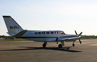 N14FJ @ KBLM - This Cessna twin casts a familiar silhouette in the fading sunlight. - by Daniel L. Berek
