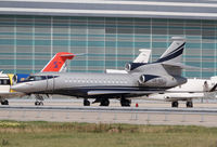 CS-TLY @ LOWW - Vinair Aeroservicos Falcon 7X - by Thomas Ranner