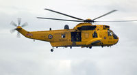 ZH542 - Landside, Crossing Bracelet Bay for winching exercise at Swansea Coast Guard Station. - by Derek Flewin