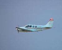 N77LB @ KOSH - Departing from EAA Airventure/Oshkosh on 24 July 2012 - by Glenn Beltz