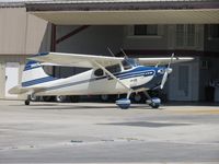 N3106B @ CNO - Parked by a hanger - by Helicopterfriend