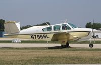 N7868L @ KOSH - Beech V35 - by Mark Pasqualino