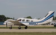 N6831J @ KOSH - Piper PA-34-200T - by Mark Pasqualino