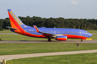 N947WN @ ORF - Southwest Airlines N947WN (FLT SWA3158) taxiing to the gate after arrival from Jacksonville Int'l (KJAX). This aircraft no longer has the FREE BAGS FLY HERE decal. - by Dean Heald