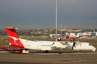 VH-QOD @ YSSY - QantasLink DHC 8 - by Thomas Ranner