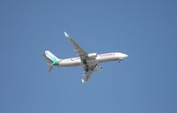 9Y-KIN @ MCO - Caribbean Air passing over Orlando Executive on way into MCO