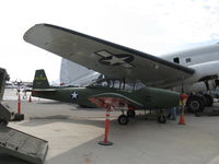 N91163 @ CMA - 1946 North American NAVION, Continental E225. under the CAF's C-46 CHINA DOLL's wing, finished as an Army UC-17 but was never a UC-17. - by Doug Robertson