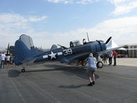 N670AM @ CMA - 1993 Douglas/Maloney SBD-5 DAUNTLESS dive bomber, Wright  R-1820 Cyclone 9 cylinder 1,200 Hp, dive brakes deployed attract interest - by Doug Robertson